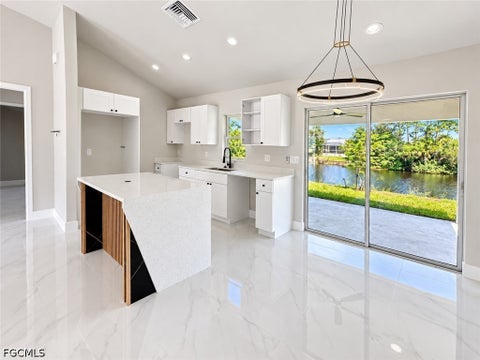 Tiny photo for 2409 NE 19th Avenue, Cape Coral, FL 33909 (MLS # 2026039549)