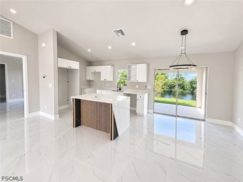Tiny photo for 2409 NE 19th Avenue, Cape Coral, FL 33909 (MLS # 2026039549)