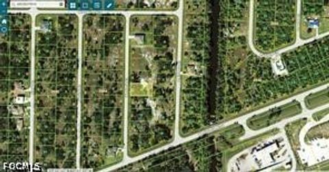 Photo of 440 Wenlock Street, Port Charlotte, FL 33954 (MLS # 2026015333)