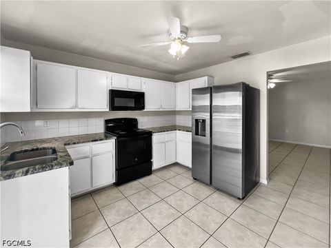 Photo of 2704 Owen Avenue, Lehigh Acres, FL 33973 (MLS # 2026026748)