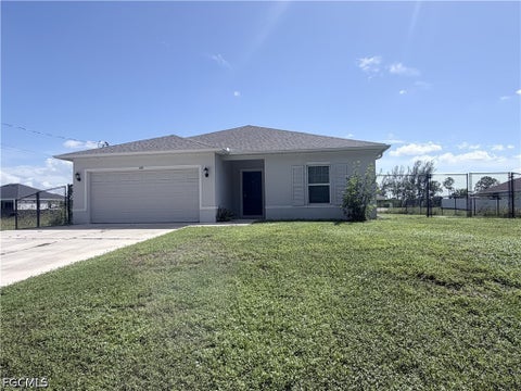 Photo of 328 Jacaranda Parkway E, Cape Coral, FL 33909 (MLS # 2026039509)