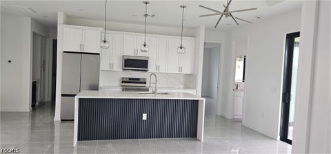 Tiny photo for 1122 NW 15 Street, Cape Coral, FL 33993 (MLS # 2026039540)