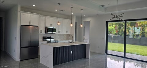 Tiny photo for 1122 NW 15 Street, Cape Coral, FL 33993 (MLS # 2026039540)