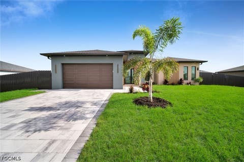 Photo of 2214 NW 24th Terrace, Cape Coral, FL 33993 (MLS # 2026035697)