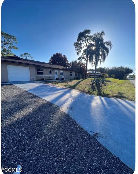 Photo of 405 W 5th Street, Lehigh Acres, FL 33972 (MLS # 2026040140)