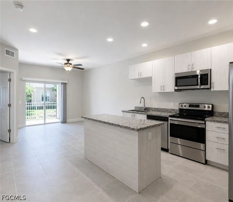 Photo of 3313 SW 8th Place #205, Cape Coral, FL 33914 (MLS # 2026026882)