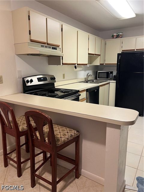 Photo of 4513 SW 8th Court #109, Cape Coral, FL 33914 (MLS # 2026014986)