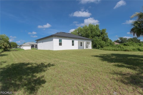 Tiny photo for 100 Denis Avenue N, Lehigh Acres, FL 33971 (MLS # 2026039468)