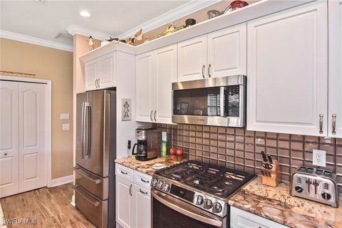 Tiny photo for 9819 Ensign Court, Fort Myers, FL 33919 (MLS # 225054592)