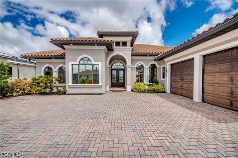Photo of 601 SW 40th Terrace, Cape Coral, FL 33914 (MLS # 2026040433)