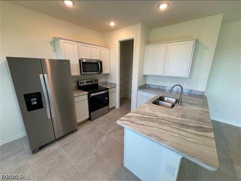 Tiny photo for 408 NW 31st Place, Cape Coral, FL 33993 (MLS # 2026030999)