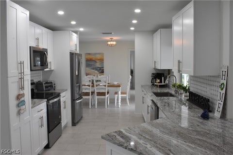 Tiny photo for 4135 Coronado Parkway, Cape Coral, FL 33904 (MLS # 2026031025)