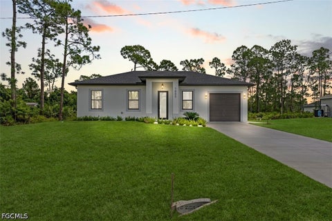 Photo of 1005 SW Brenton Avenue, Lehigh Acres, FL 33974 (MLS # 2026040743)