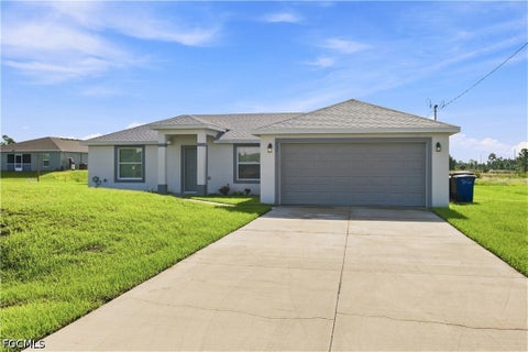 Photo of 737 Ferguson Avenue S, Lehigh Acres, FL 33974 (MLS # 2026036882)