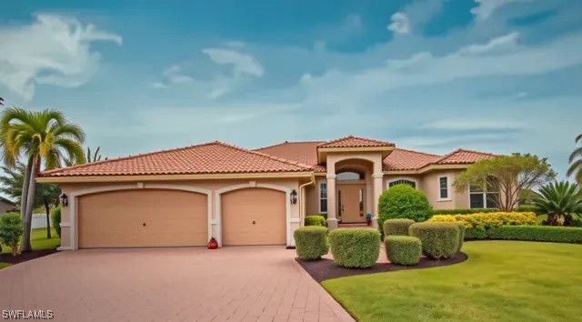 Mediterranean / spanish house featuring a front la