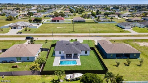 Tiny photo for 1408 Nelson Road N, Cape Coral, FL 33993 (MLS # 2026039537)