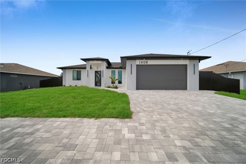 Photo of 1408 Nelson Road N, Cape Coral, FL 33993 (MLS # 2026039537)
