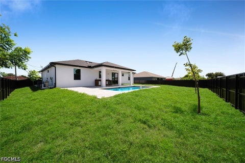 Tiny photo for 1408 Nelson Road N, Cape Coral, FL 33993 (MLS # 2026039537)