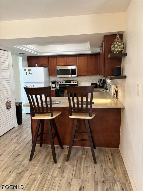 Tiny photo for 879 Lake McGregor Drive, Fort Myers, FL 33919 (MLS # 2026017867)