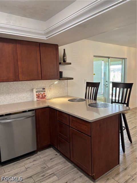 Tiny photo for 879 Lake McGregor Drive, Fort Myers, FL 33919 (MLS # 2026017867)