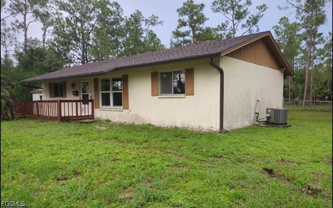 Photo of 2104 E 9th Street, Lehigh Acres, FL 33936 (MLS # 2026038522)