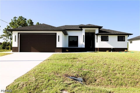 Photo of 1214 Delores Street E, Lehigh Acres, FL 33974 (MLS # 2026037408)
