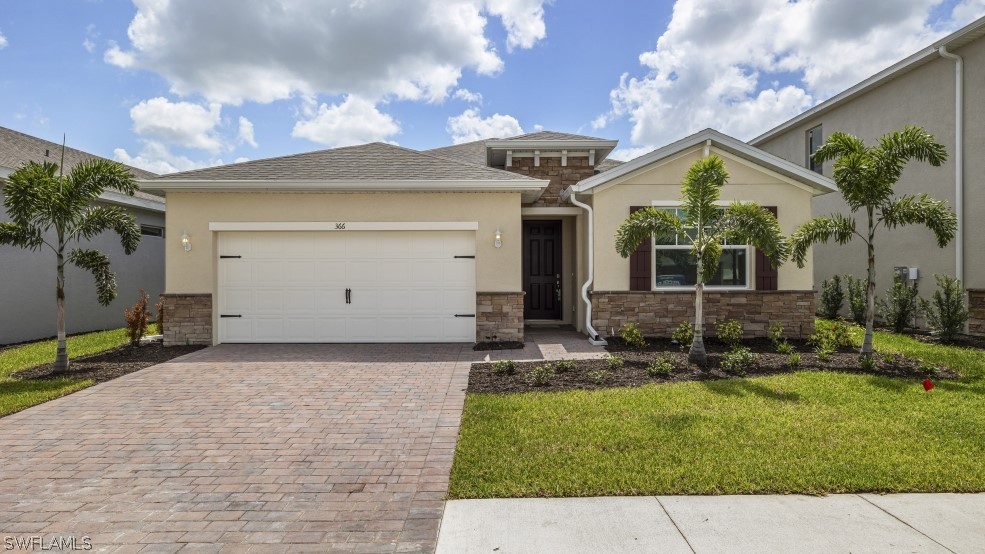 Model home. Ranch-style house with stone siding, s