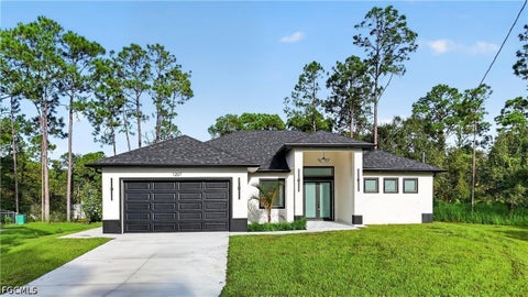 Photo of 1207 Ramus Street E, Lehigh Acres, FL 33974 (MLS # 2026042669)