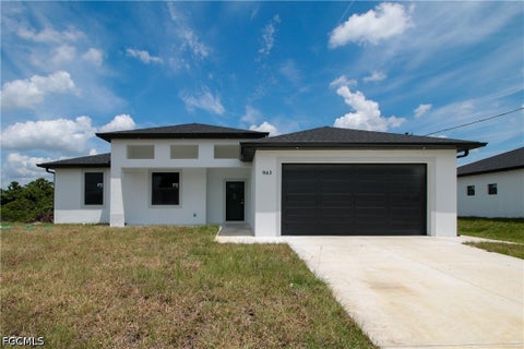 Photo of 943 Commodore Street, Lehigh Acres, FL 33974 (MLS # 2026038226)