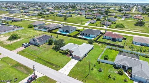 Tiny photo for 2021 NW Juanita Place, Cape Coral, FL 33993 (MLS # 2026030757)