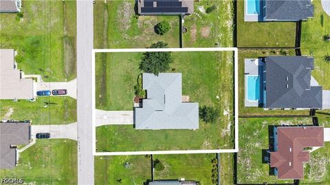 Tiny photo for 2021 NW Juanita Place, Cape Coral, FL 33993 (MLS # 2026030757)