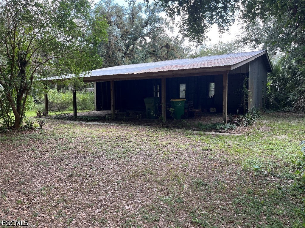 351 E Hickpochee Ave/SR 80 + S Oak Street