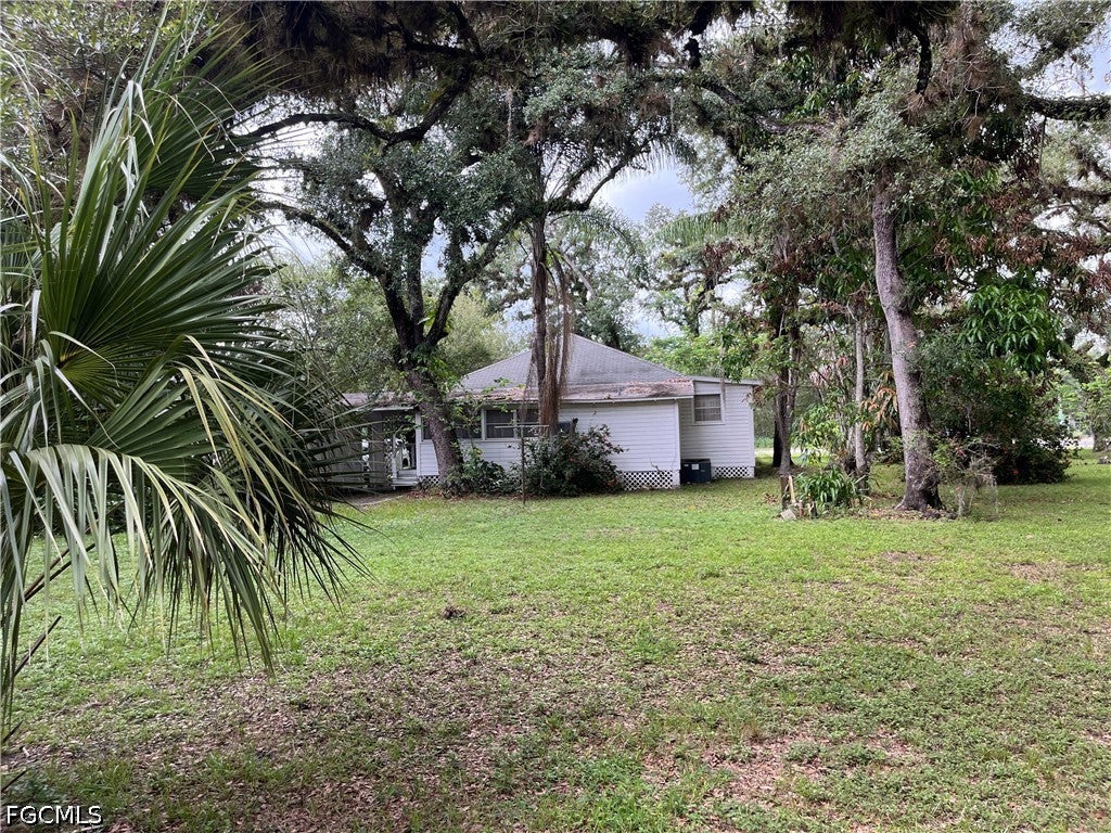 351 E Hickpochee Ave/SR 80 + S Oak Street