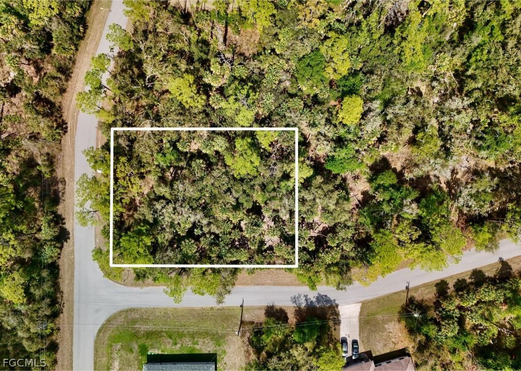 Aerial view of property's location with property p