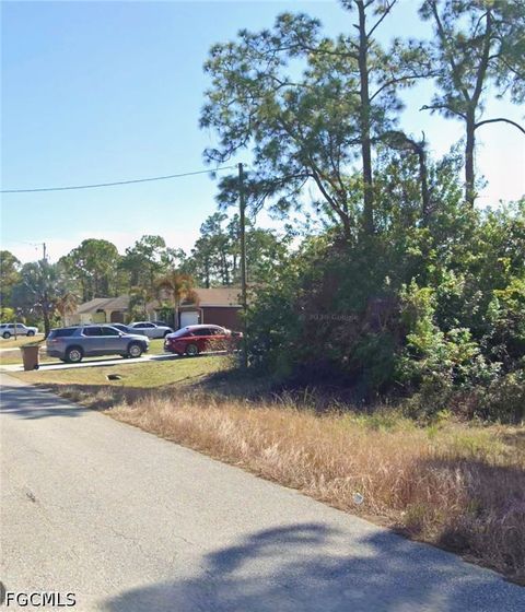 Tiny photo for 1048 Summa Boulevard, Lehigh Acres, FL 33974 (MLS # 2026030948)