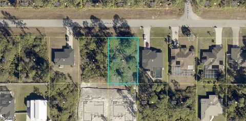 Photo of 1048 Summa Boulevard, Lehigh Acres, FL 33974 (MLS # 2026030948)