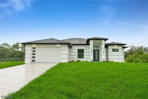 Photo of 3901 39th Street SW, Lehigh Acres, FL 33976 (MLS # 2026040615)