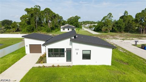 Photo of 3000 Tena Avenue S, Lehigh Acres, FL 33976 (MLS # 2026031498)