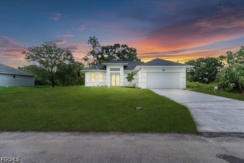 Photo of 404 W 15th Street, Lehigh Acres, FL 33972 (MLS # 2026030639)