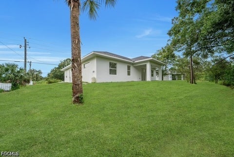 Tiny photo for 404 W 15th Street, Lehigh Acres, FL 33972 (MLS # 2026030639)