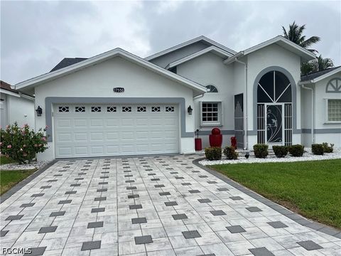 Photo of 17550 Fan Palm Court, North Fort Myers, FL 33917 (MLS # 2026020100)