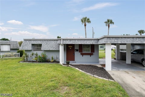 Photo of 330 Suffolk Court, Lehigh Acres, FL 33936 (MLS # 2026041046)