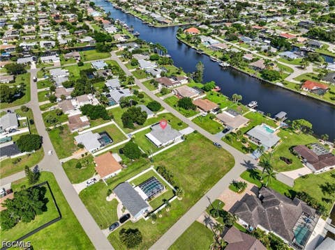 Photo of 713 SE 43rd Street, Cape Coral, FL 33904 (MLS # 2026035134)