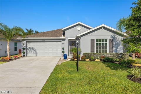 Photo of 3813 Treasure Oak Way, Fort Myers, FL 33905 (MLS # 2026035621)