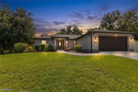 Photo of 1056 Cazenovia Street, Port Charlotte, FL 33952 (MLS # 2026038738)