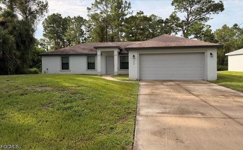 Photo of 1252 County Street E, Lehigh Acres, FL 33974 (MLS # 2026041310)