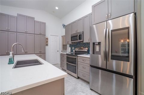 Tiny photo for 844 SW 17th Terrace, Cape Coral, FL 33991 (MLS # 2026015381)