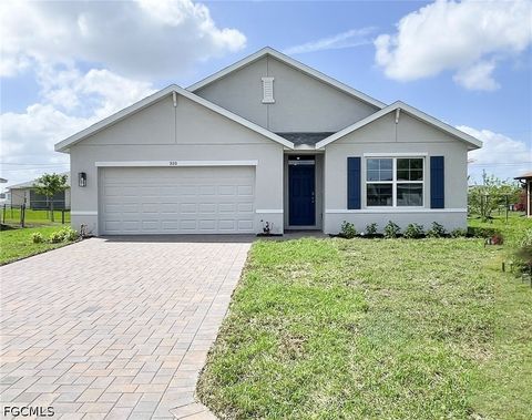Photo of 920 NE 10th Street, Cape Coral, FL 33909 (MLS # 2026015504)