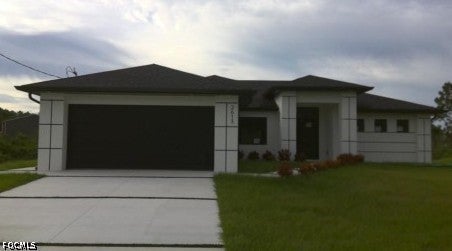 Photo of 2613 40th Street W, Lehigh Acres, FL 33971 (MLS # 2026041646)