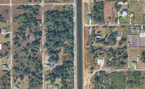 Photo of 1709 Hines Avenue, Lehigh Acres, FL 33972 (MLS # 2026019944)